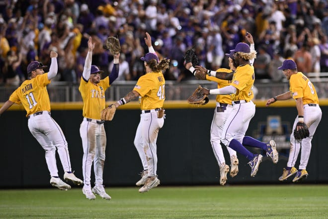 Jun 24, 2023; Omaha, NE, USA;  The LSU Tigers celebrates in the outfield the win against the Florida Gators at Charles Schwab Field Omaha. Mandatory Credit: Steven Branscombe-USA TODAY Sports
