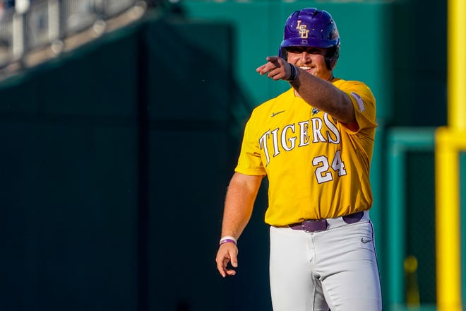 Jun 24, 2023; Omaha, NE, USA; LSU Tigers designated hitter Cade Beloso (24) reacts after making it to second on an error by the Florida Gators during the third inning at Charles Schwab Field Omaha. Mandatory Credit: Dylan Widger-USA TODAY Sports