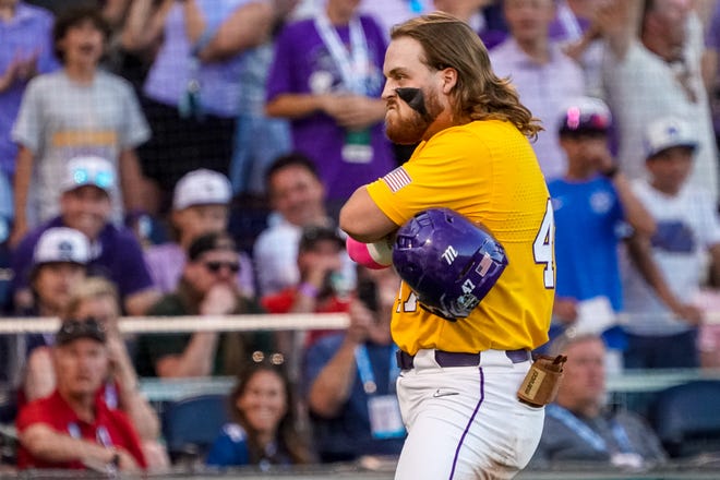 Jun 24, 2023; Omaha, NE, USA; LSU Tigers third baseman Tommy White (47) celebrates after hitting a home run against the Florida Gators during the eighth inning at Charles Schwab Field Omaha. Mandatory Credit: Dylan Widger-USA TODAY Sports